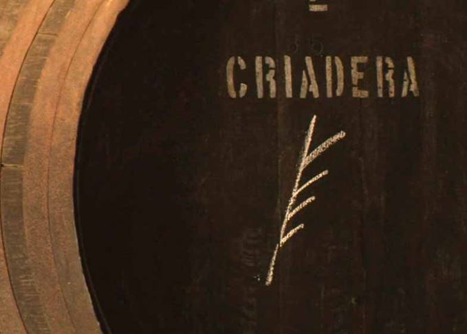 Solera systems: A trademark ‘palma’ (chalk mark), which is often used on solera casks Sherry Solera